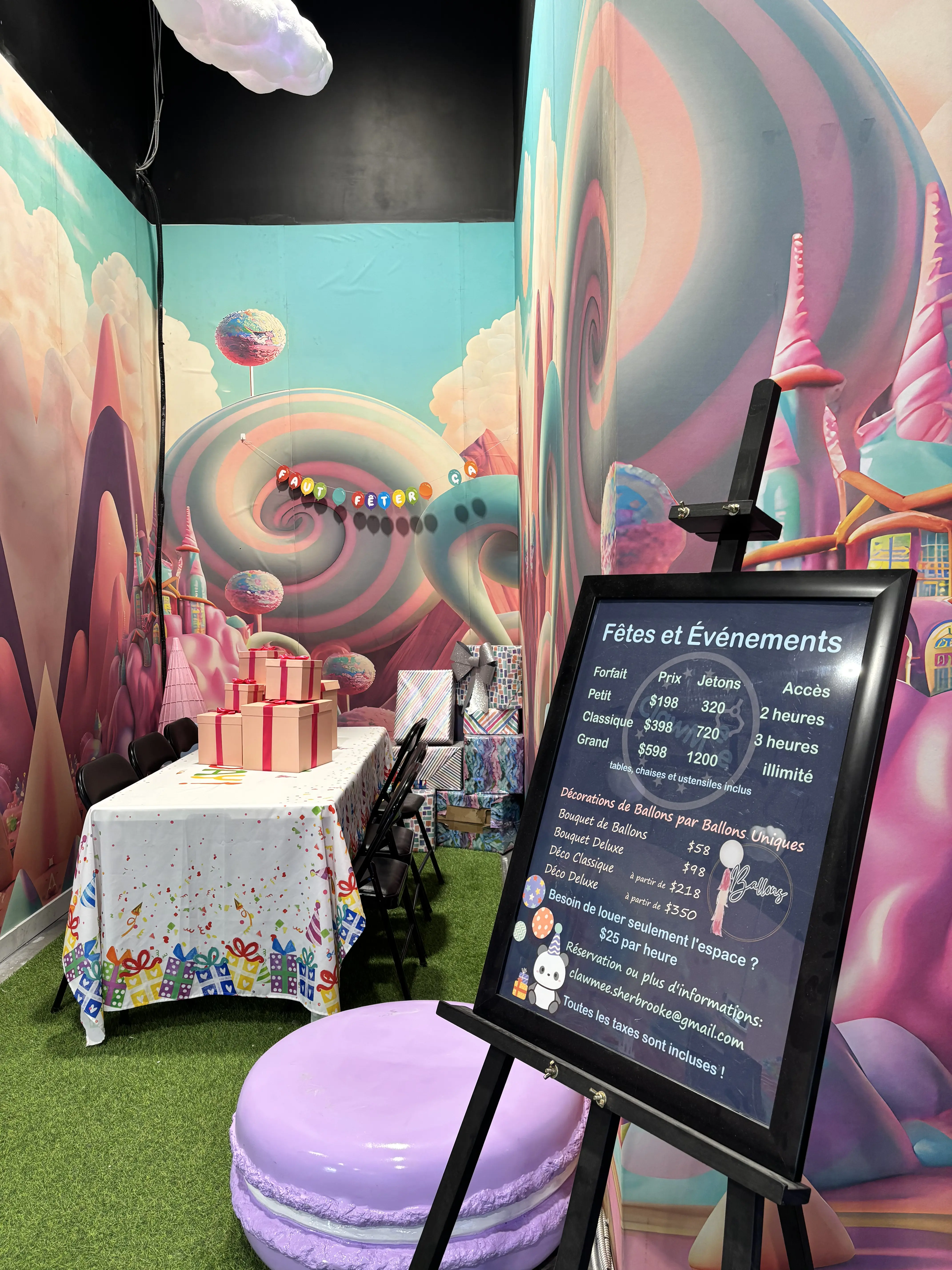 Birthday gift table in front of the candyland decor at ClawMee Sherbrooke